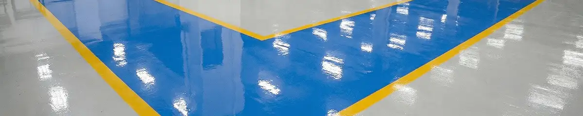 A factory floor professionally covered and marked with epoxy flooring in Savannah, GA