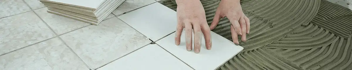 Professional installing white tile floors in Savannah, GA