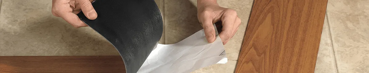 A professional installing vinyl flooring in Savannah, GA